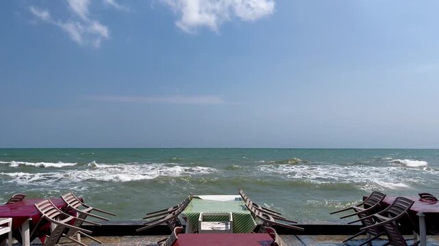 Rough sea waves at the restaurant