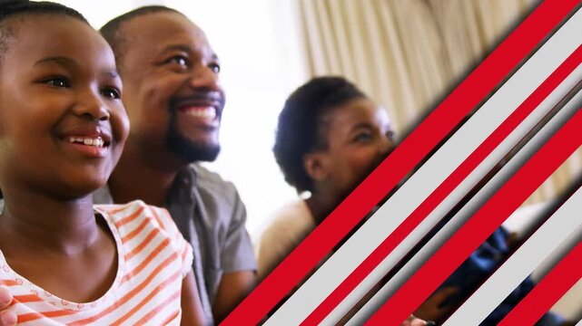 Family pressing controller, reacting on sofa, diagonal bars sliding, revealing faces during gaming