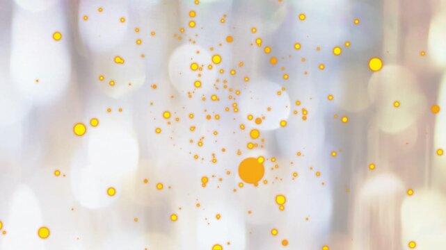 Seed flecks sparking gold dots grouping pulsing drifting fading showing life over bokeh backdrop