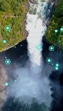 Vertical video: Channel narrowing pushing water column to plunge, making rising mist and teal nodes