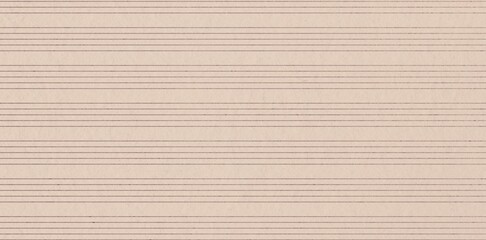 A high-resolution close-up of sheet music paper featuring multiple sets of horizontal five-line staves on a warm, off-white textured background. © alongkorn89