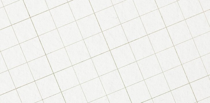 A clean, high-resolution close-up of white grid paper with thin grey lines, presented at a diagonal angle.
