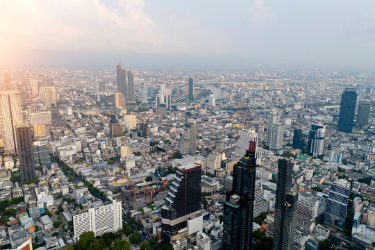 Cityscape Bangkok from a height aerial view, many high rise skyscrapers, panoramic view into the distance