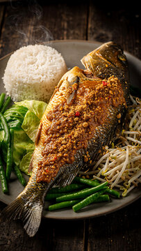 Authentic Malaysian Pecal Tilapia - Crispy Fried Fish with Thick Peanut Sauce and Fresh Blanched Vegetables Static Food Photography