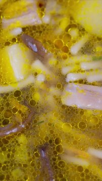 Hearty vegetable mushroom broth served. Warm mushroom noodles in flavorful broth. Delicate herbs complement rich vegetable mushroom broth served with steaming noodles