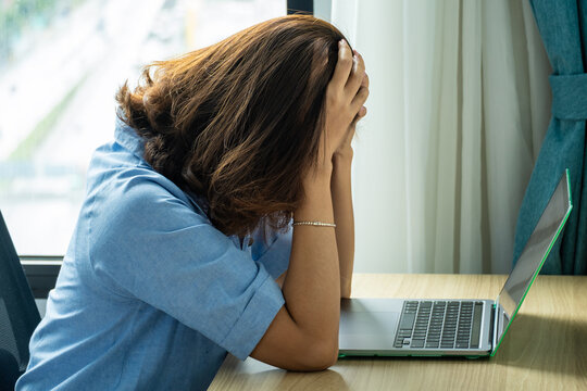 woman sitting in the corner of the room have emotional and mental problems He has depression and stress from society and work. medical concept.	
