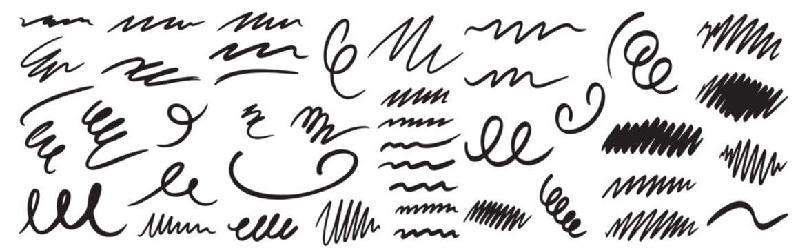Collection of handwritten strokes and scribbles on white background