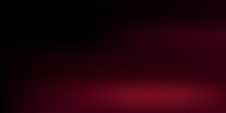 Blurred red free form colored abstract  on black background. Smooth transitions of iridescent colors. Abstract color gradient film grain texture background.Colorful gradient