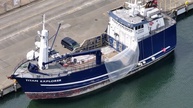 Steady View of Crew prepping a fishing vessel for Alaska season