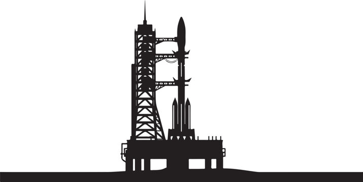 Black silhouette of a rocket on a launchpad with tower