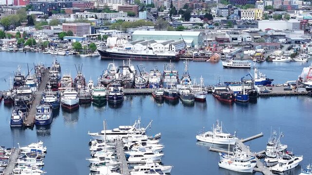 Long Look at Fishermans Terminal fishing boats with Ballard behind