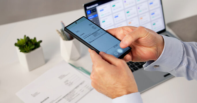 Man Uses Smartphone To Capture Document