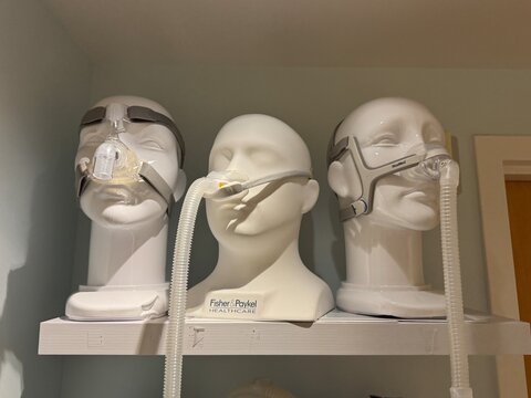 Treating sleep apnea masks. Display of various CPAP and BIPAP masks on mannequin heads. Kirkland, WA, USA - 19 February 2026