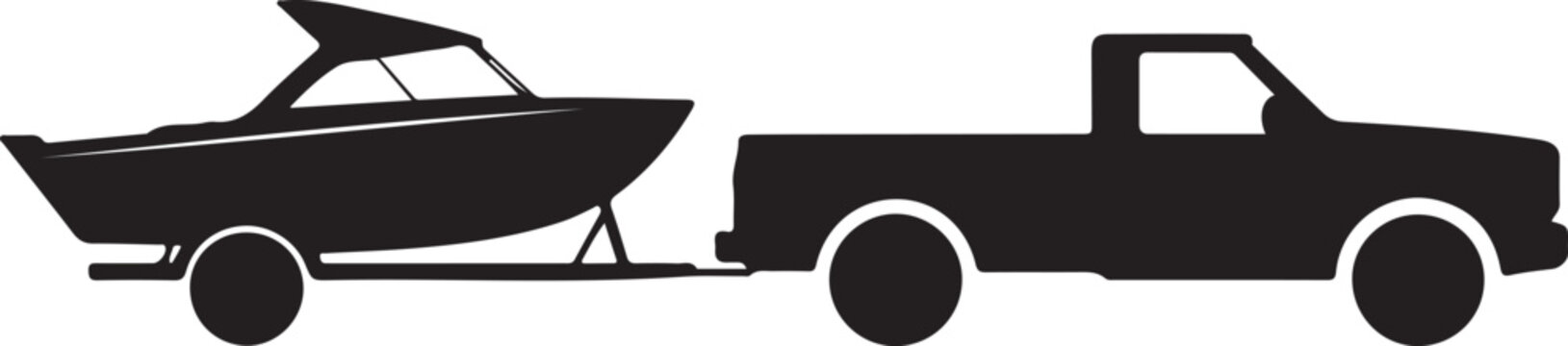 Black pickup truck towing a boat trailer