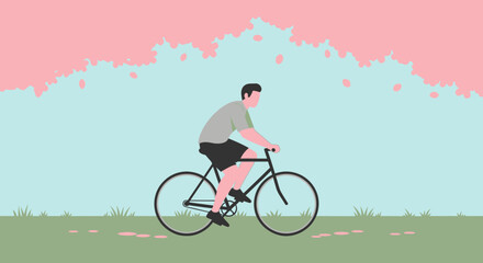 Naklejka premium Man riding bicycle under cherry blossoms in spring park