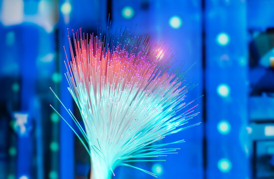  Fiber optics network cable on technology background