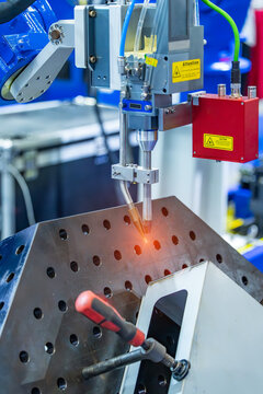 Robotic Welding Machine in a Metal Manufacturing Plant