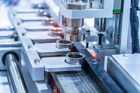 robotic arm catch for electronic assembly line. The robot for smart technology manufacturing process.