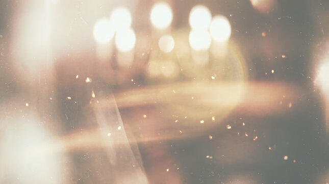 Generative AI, Golden Lens Flare Bokeh Light Streak Abstract Background with Film Grain