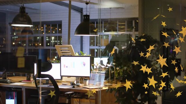 Camera panning right, workstation glowing and gold star decals drifting inward to highlight charts
