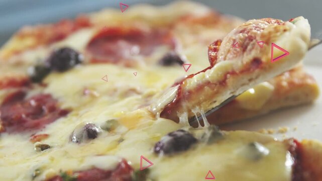 Spatula initiating lift, pizza slice rising with cheese stretching and snapping to showcase texture