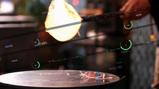 Artisan lifting rod, molten gather spinning and being pinched, rolled, pressed to form demo shape