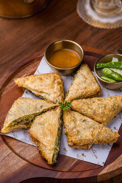 Mutabbaq is a dish originating from the Middle East. It contains eggs, chopped spring onions, and thinly-skinned meat that is fried dry.