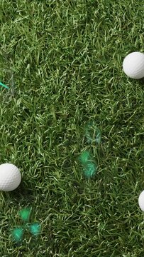 Vertical video: Golf balls appearing frame4 AR icons pulsing marking up-arrow on turf guiding putts