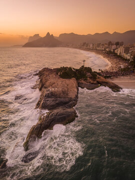 Beautiful aerial view to people watching the sunset from Arpoador