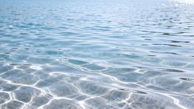 Ripples on clear blue water surface