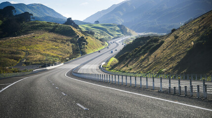 Obraz premium Transmission Gully Motorway. Motorway winding through the deep gully. Wellington Northern Corridor. New Zealand.