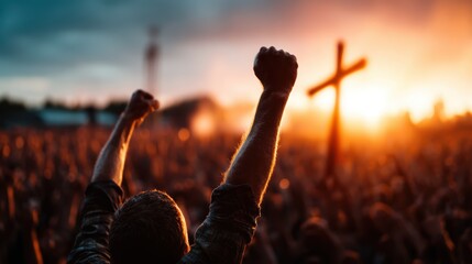 Obraz premium A powerful image shows a crowd with raised fists, silhouetted against a stunning sunset, symbolizing unity, strength, and the passionate spirit of collective celebration.