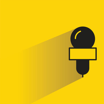 mic icon with drop shadow on yellow background