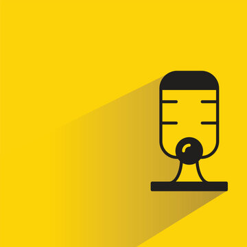 mic icon with drop shadow on yellow background