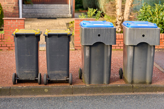 Garbage bins beside the road