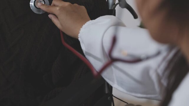 Doctor using a stethoscope checking patient with examining, presenting results symptom and recommend treatment method, Healthcare and medical concept