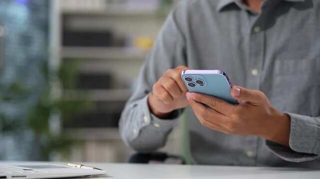 Email notification concept, Male use smartphone and laptop receive message alert in the mailbox.