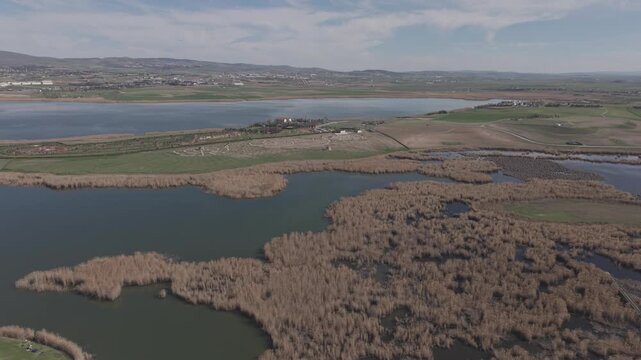 Cinematic Documentary-Style Drone Flight Over Endless Lake and Reeds at Mogan Lake in Ankara, Turkey