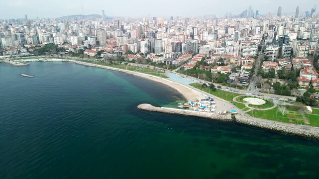 Erenkoy Public Beach, sunny weather in Istanbul, fly back shot