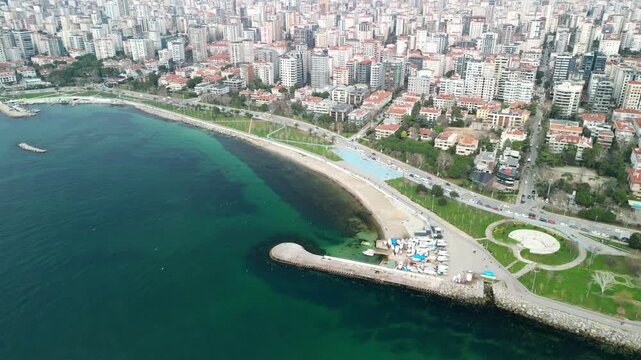 Erenkoy Public Beach, sunny weather in Istanbul, fly above shot