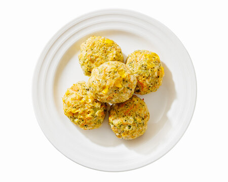 baked meat and vegetable polpette on plate