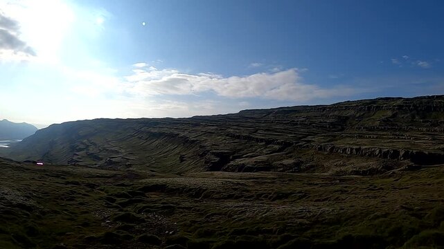 POV drive past sharp turn road signs in Icelandic highlands