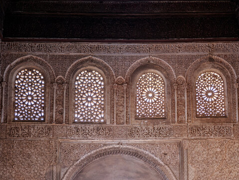 Ornate Moorish Stone Lattice Windows and Carved Islamic Arch Interior With Geometric Motifs, Alhambra, Granada