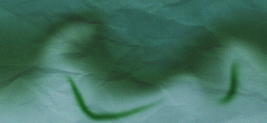 A green and blue pixelated image with a dark shape in the center © JalalCreative