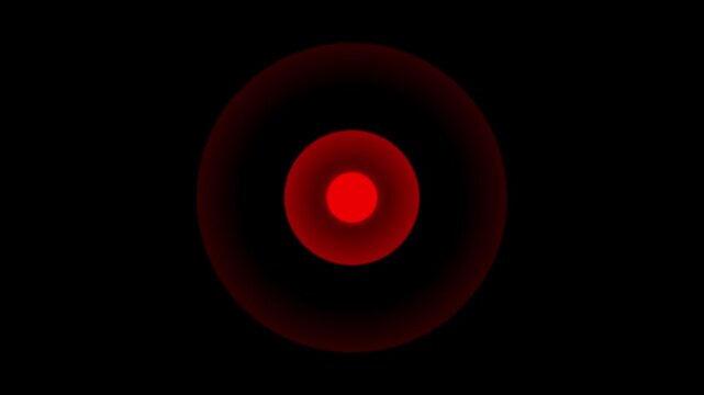 A glowing circle on a black background surrounds a red pulsing dot. This isolated looped animation has an4k black background icon animation