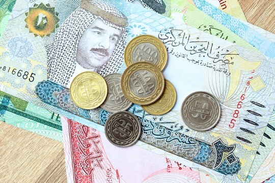 Bahraini dinar money bills and coins on table. Bahrain cash of BHD currency close up