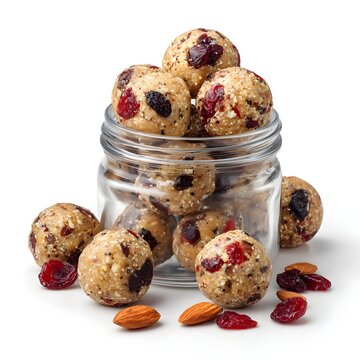 Glass jar with oat nut seed cranberry snack balls highlighting healthy homemade energy bites and nutritious lifestyle food choice
