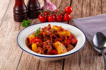 Stew Hungarian goulash with beef and vegetables © Andrei Starostin