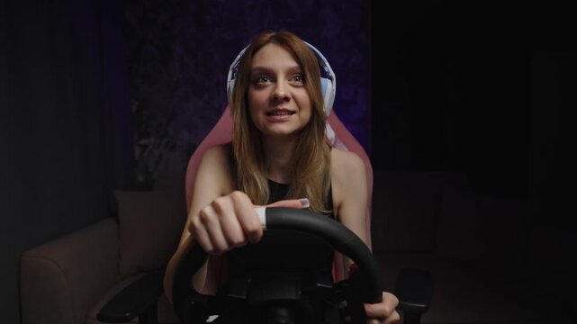 Astonished Sim Reaction White Woman Mouth Open Wide With Headset And Steering Wheel In Pink Chair, Shocked