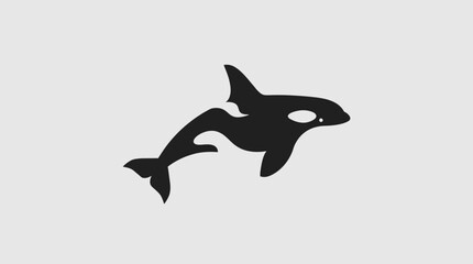 Black silhouette of an orca swimming. © Abhinaya Project
